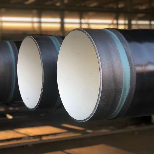 Three-layer coated line pipe with a black polyethylene outer layer and lined bore, cut ends visible on a rack