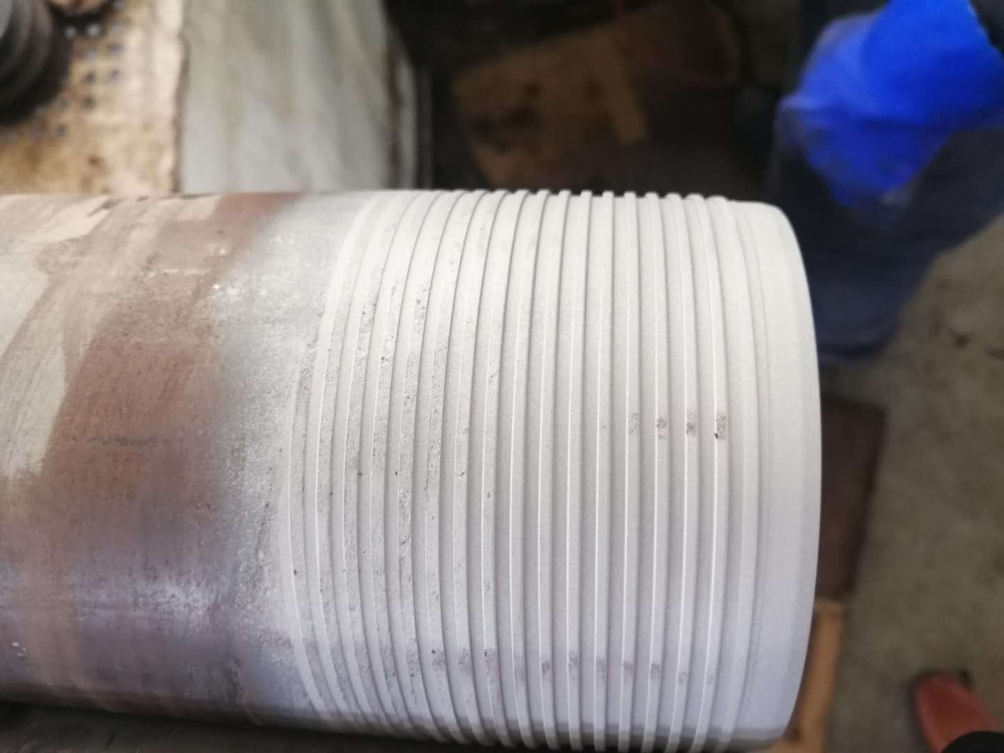 Close-up of a sandblasted matte machined thread on a pipe end
